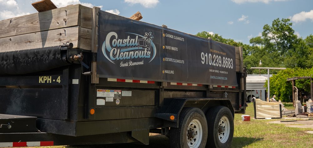 Coastal Cleanouts branded junk removal trailer in Wilmington NC